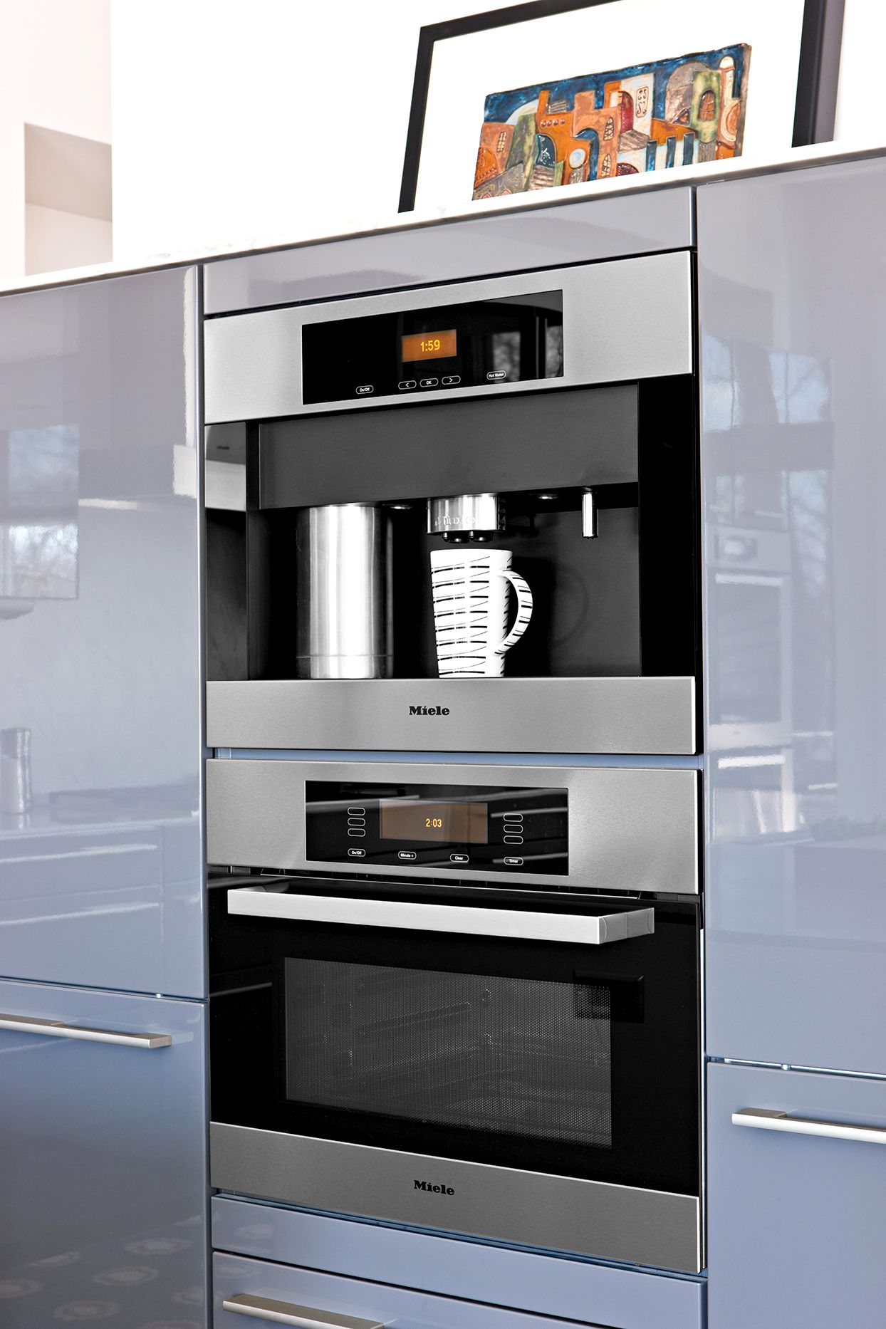 gray cabinets with built in coffee machine