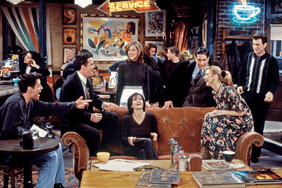 cast of friends laughing together at central perk