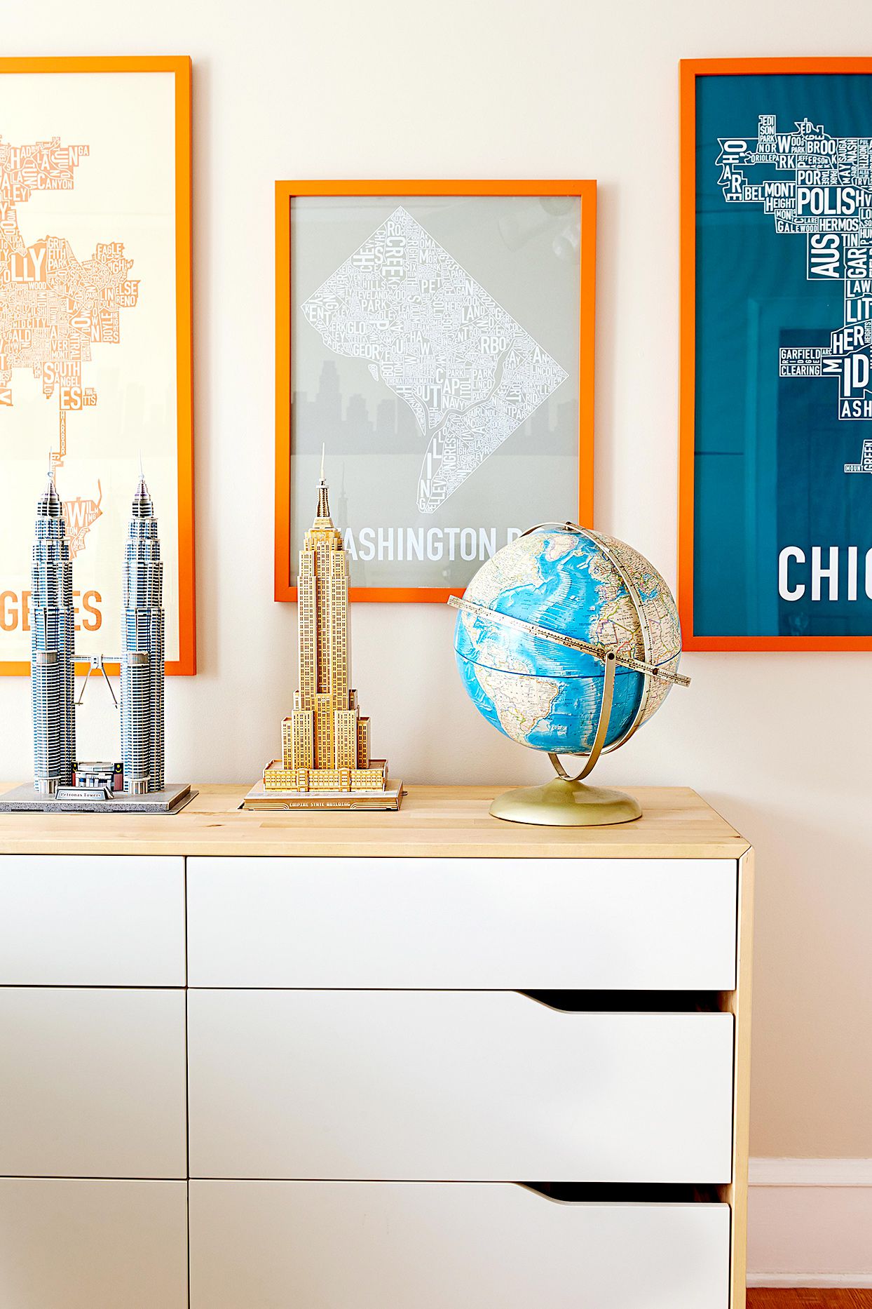Dresser with globe and travel d&eacute;cor