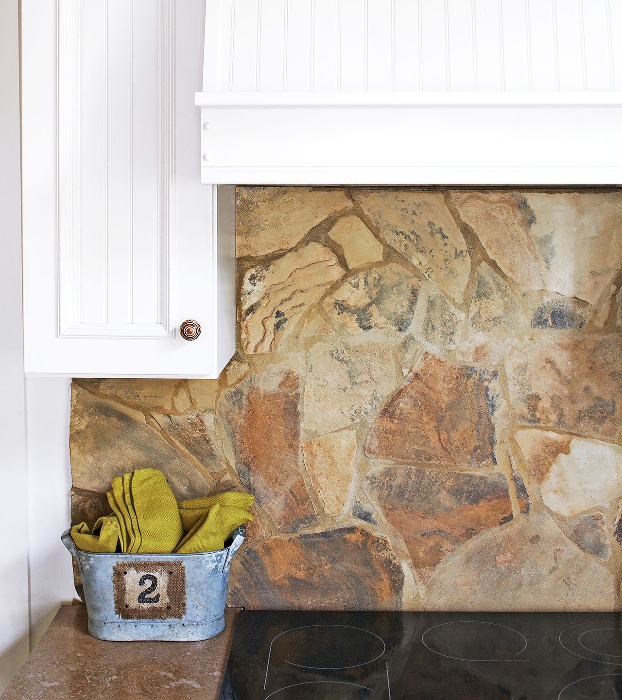 rough-cut stone backsplash