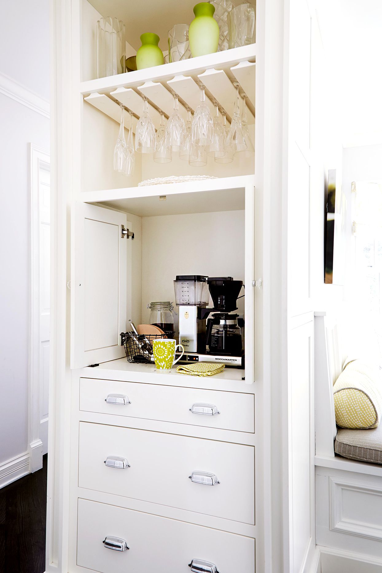 white cabinets with coffee station on shelf