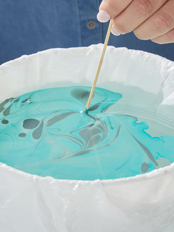 stirring nail polish color mix