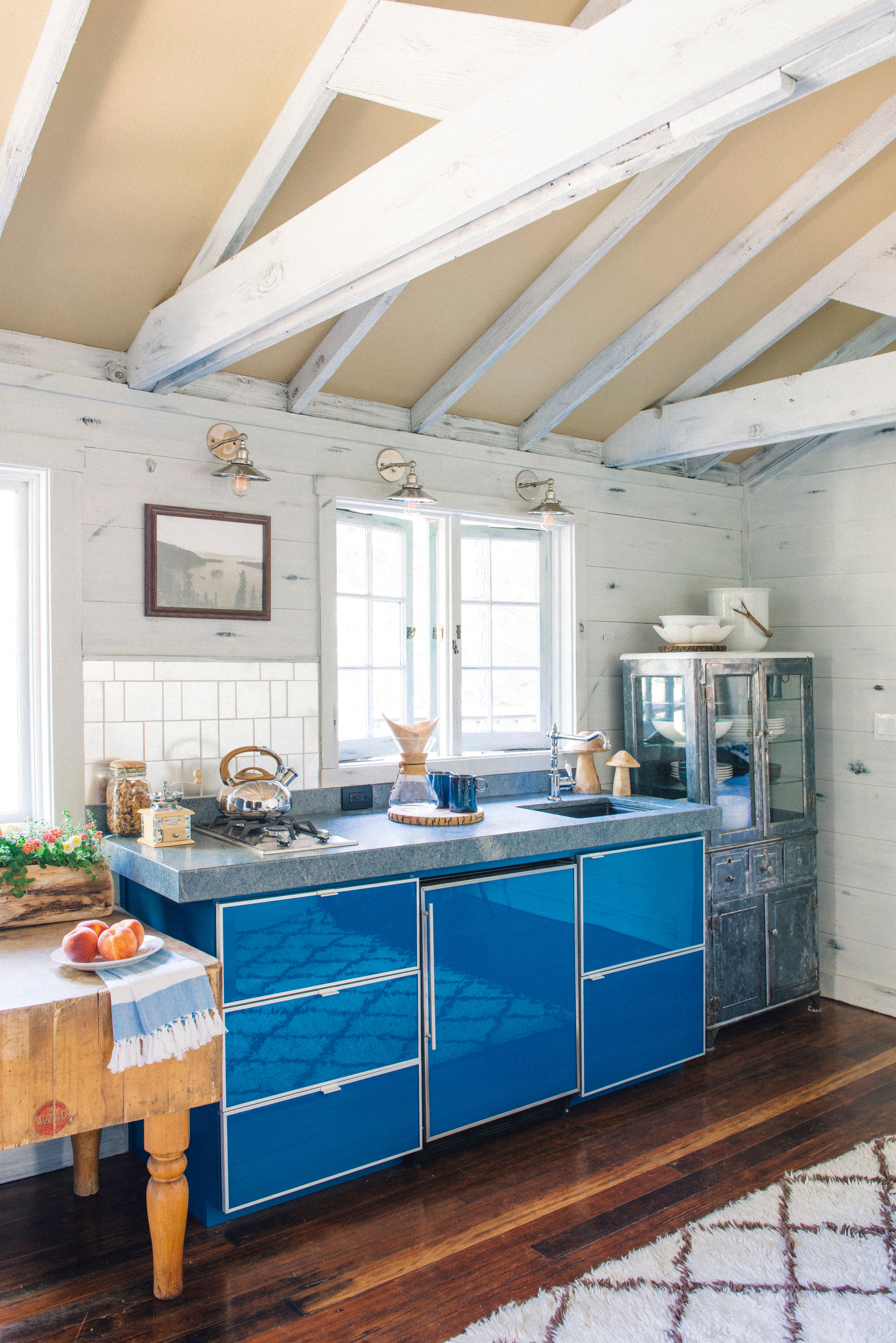 coastal kitchen with blue cabinets