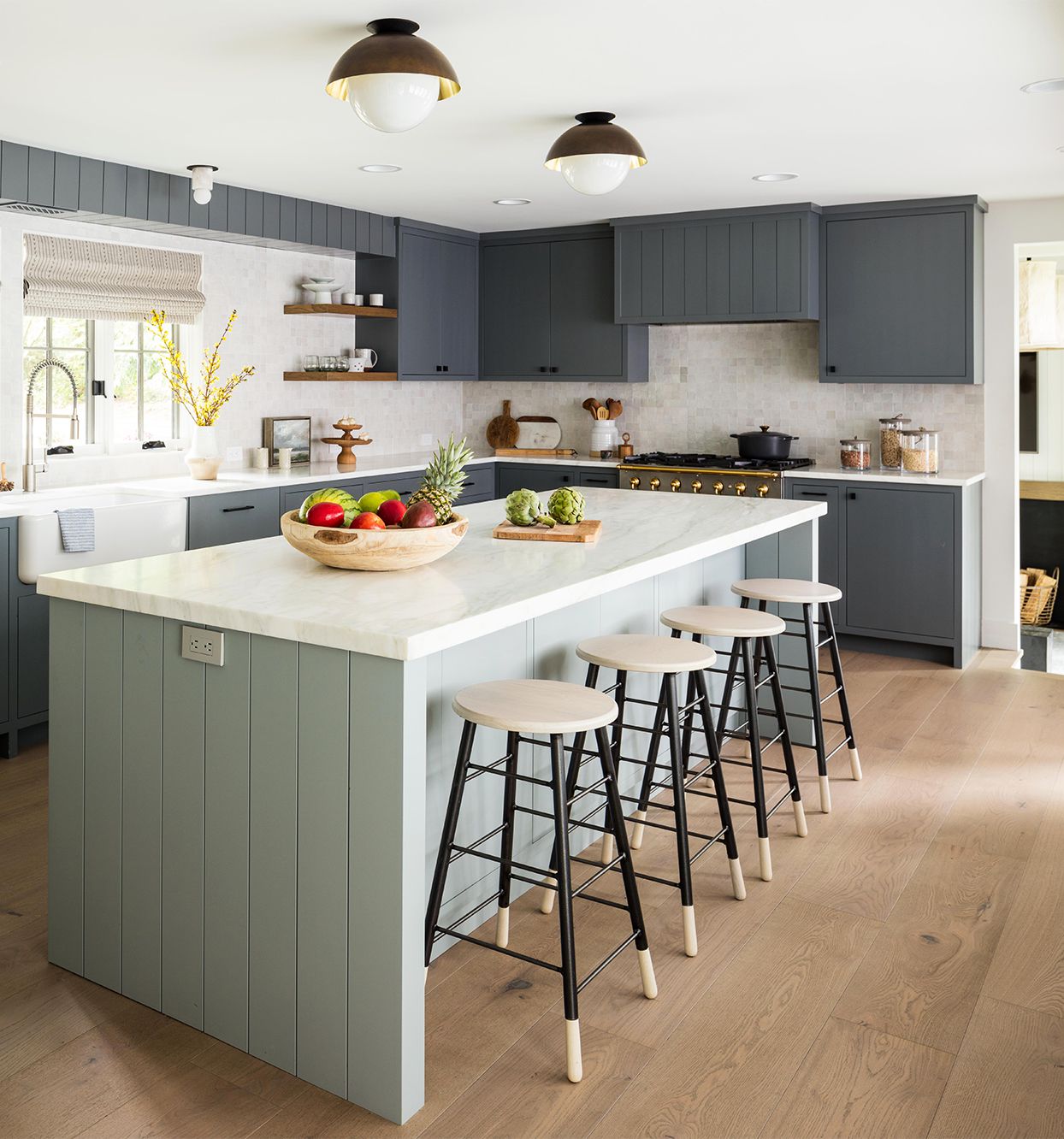 blue-gray and white kitchen with island