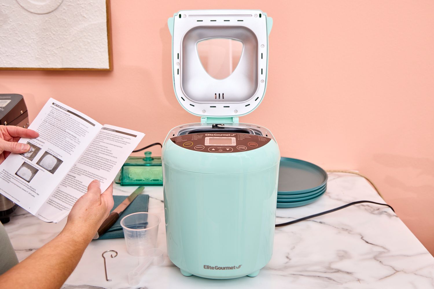 The Elite Gourmet Programmable Bread Maker with the top open