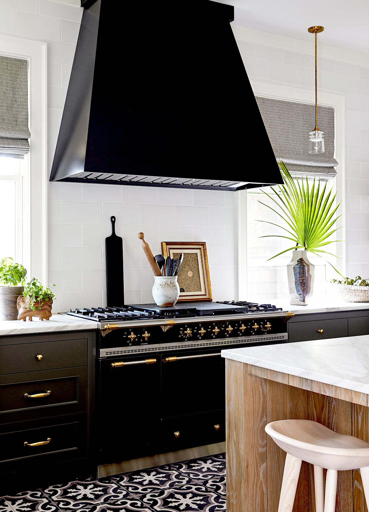 Black stove with large hood