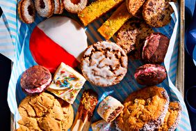 Close up view of a box of Christmas cookies with 12 different types of cookies