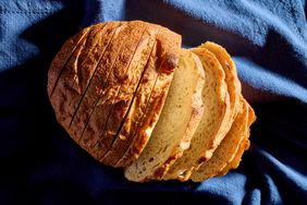 Sliced loaf of bread on a cloth