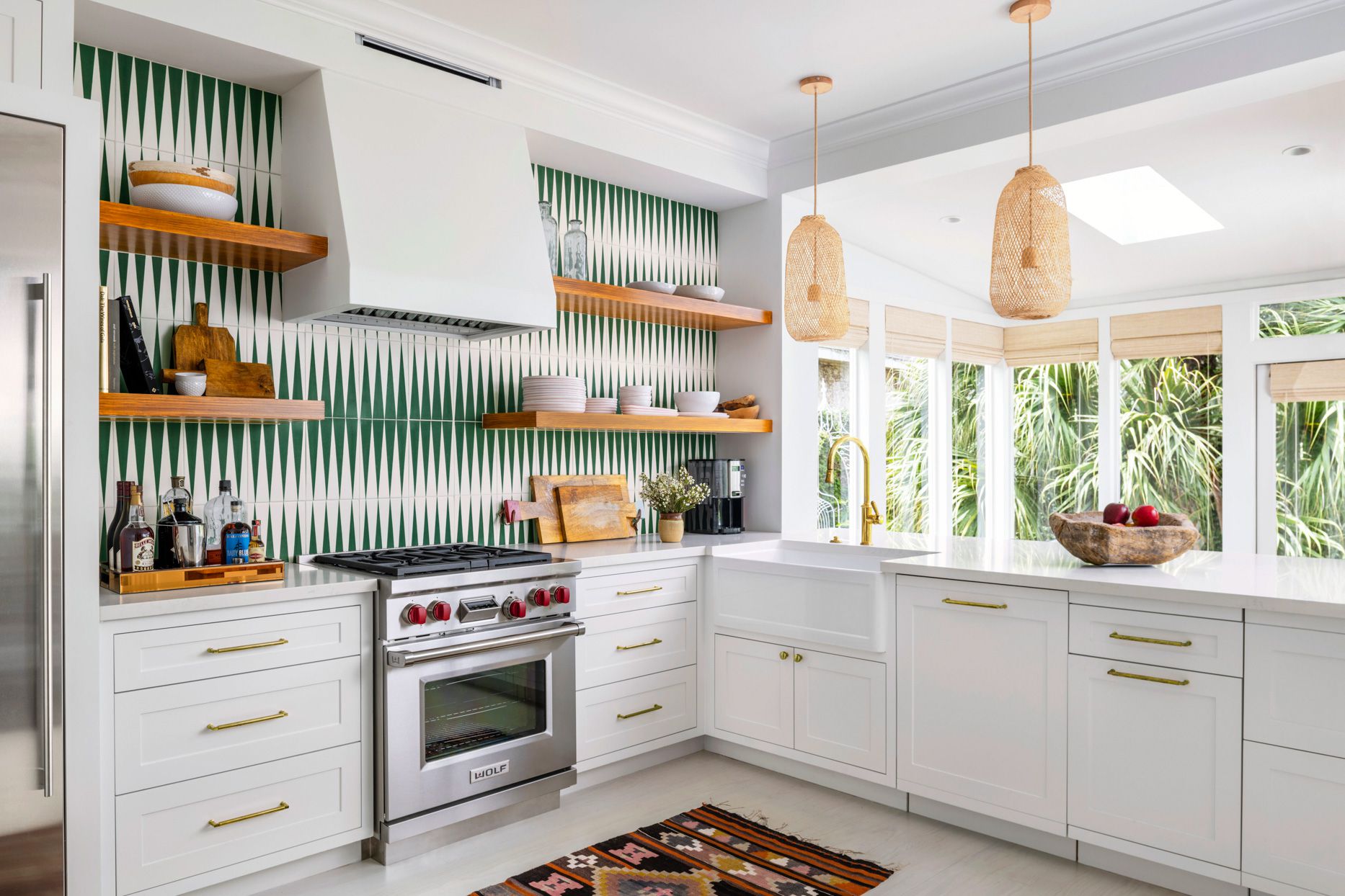 white kitchen with exposed wood shelves and patterned backsplash