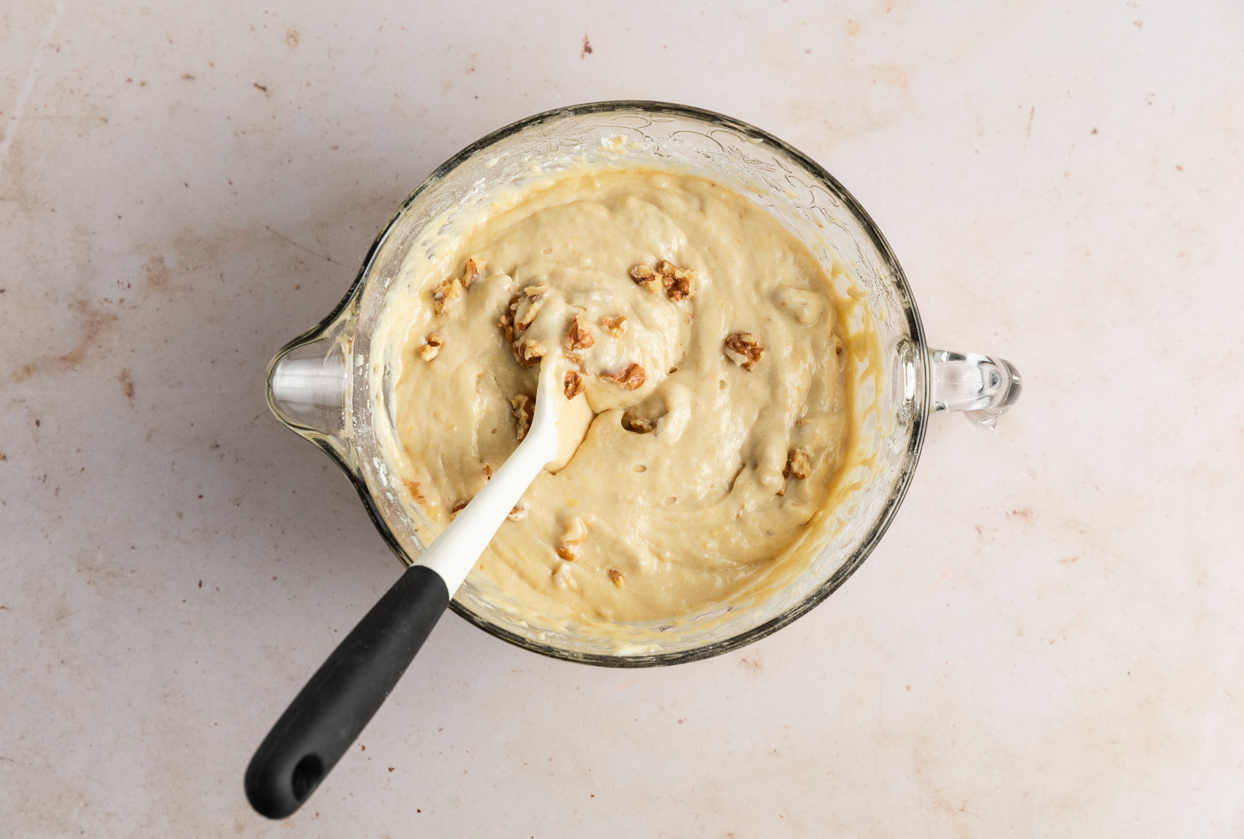 mixing in flour and nuts 