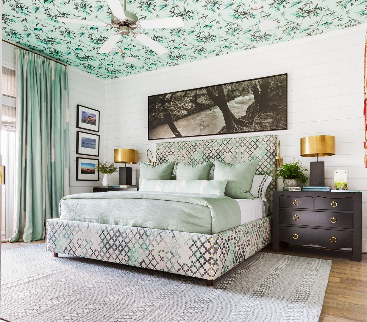 seafoam green bedroom with palm patterned ceiling