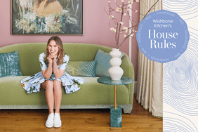 meredith hayden smiling in floral dress on green couch