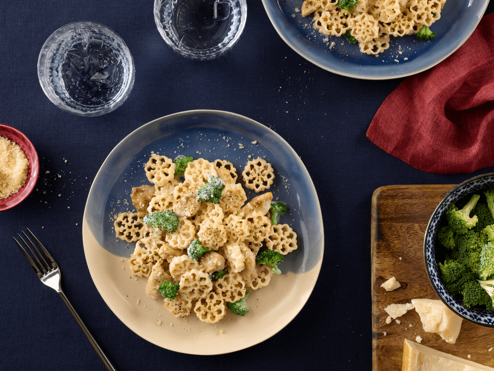 barilla limited-edition snowfall pasta cooked as chicken broccoli alfredo on a plate
