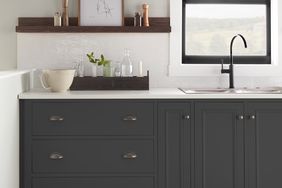 kitchen cabinets painted black by Behr