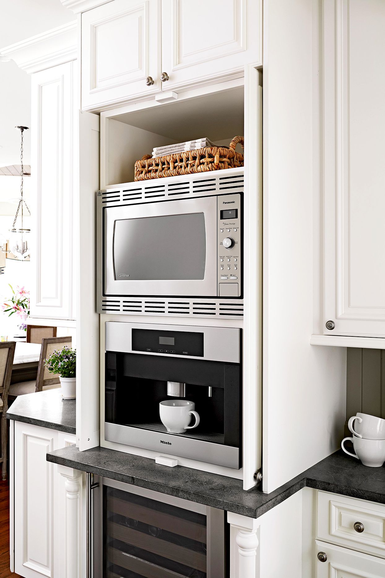 white cabinets with built in coffee machine