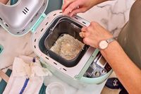 Bread dough mix inside the Elite Gourmet Programmable Bread Maker