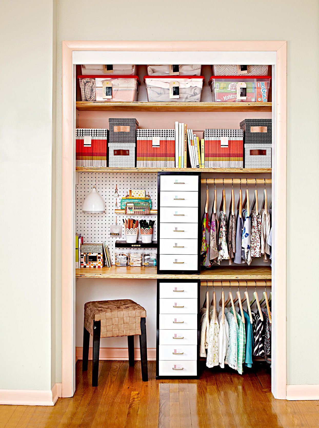 Organized closet with seating and drawers