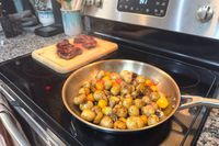 Potatoes cook in the Ninja EverClad Stainless Steel Cookware Pots and Pans Set pan